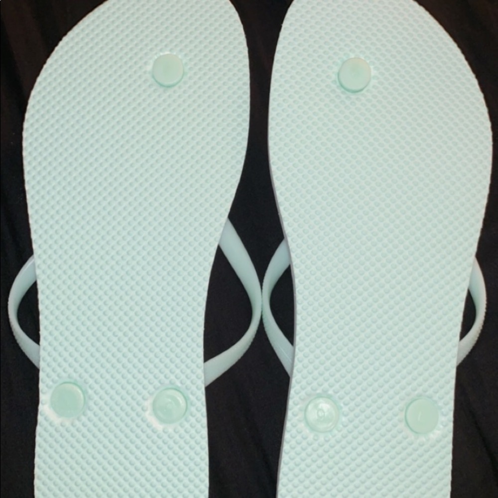 Mint green/teal flip flops